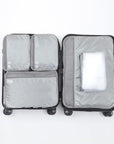 An image that shows the 5 cube bgs fitting inside a luggage.